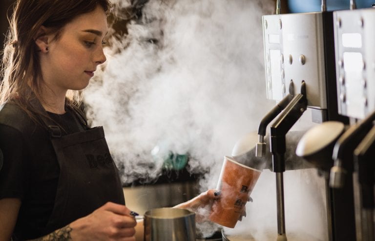 Barista making coffee